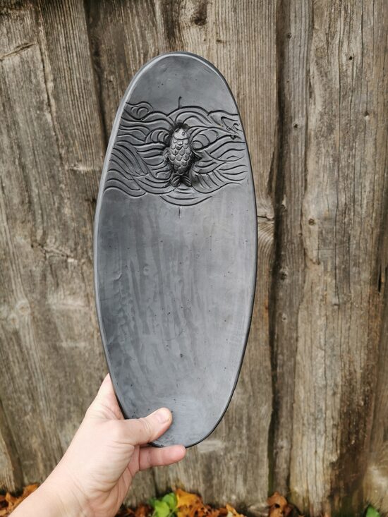 Ovāls šķīvis- Zivs peld augšup